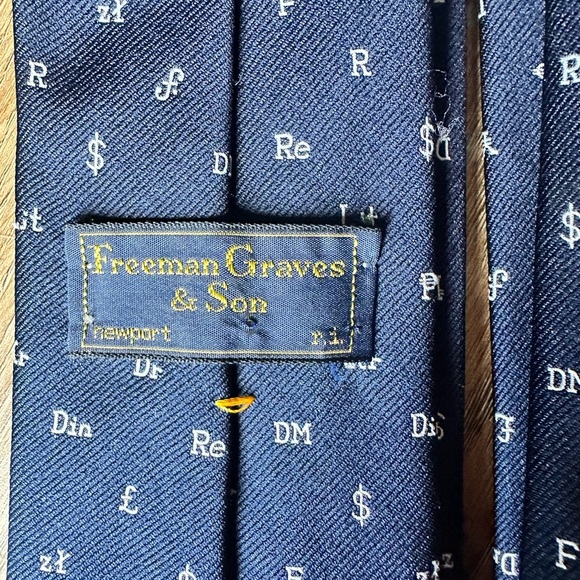 Navy blue Freeman Graves & Son men’s tie with world currency symbols. Skinny tie - Picture 4 of 4